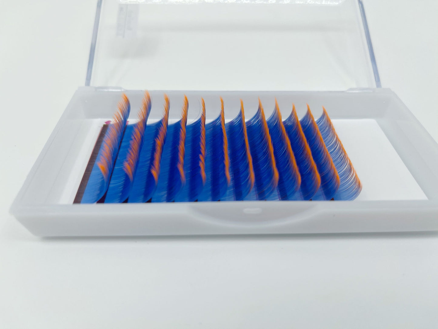 Blue to orange neon color lashes ;Glows under blue light